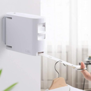 Wall-mounted retractable clothesline.